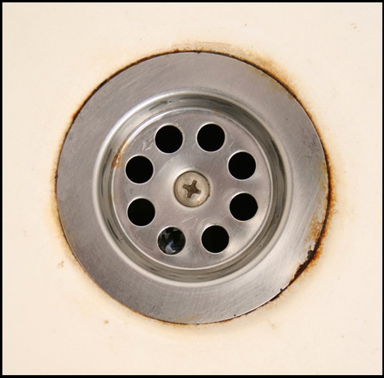 Iron rust stains on sink and drain
